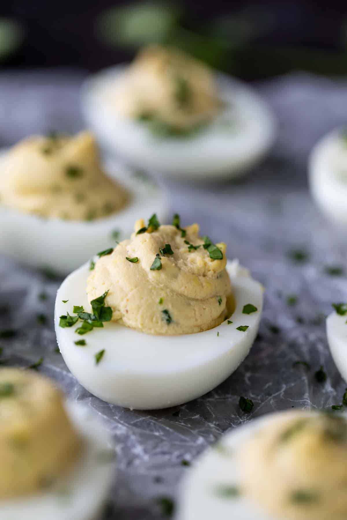 Asian Inspired Deviled Eggs with minced cilantro.