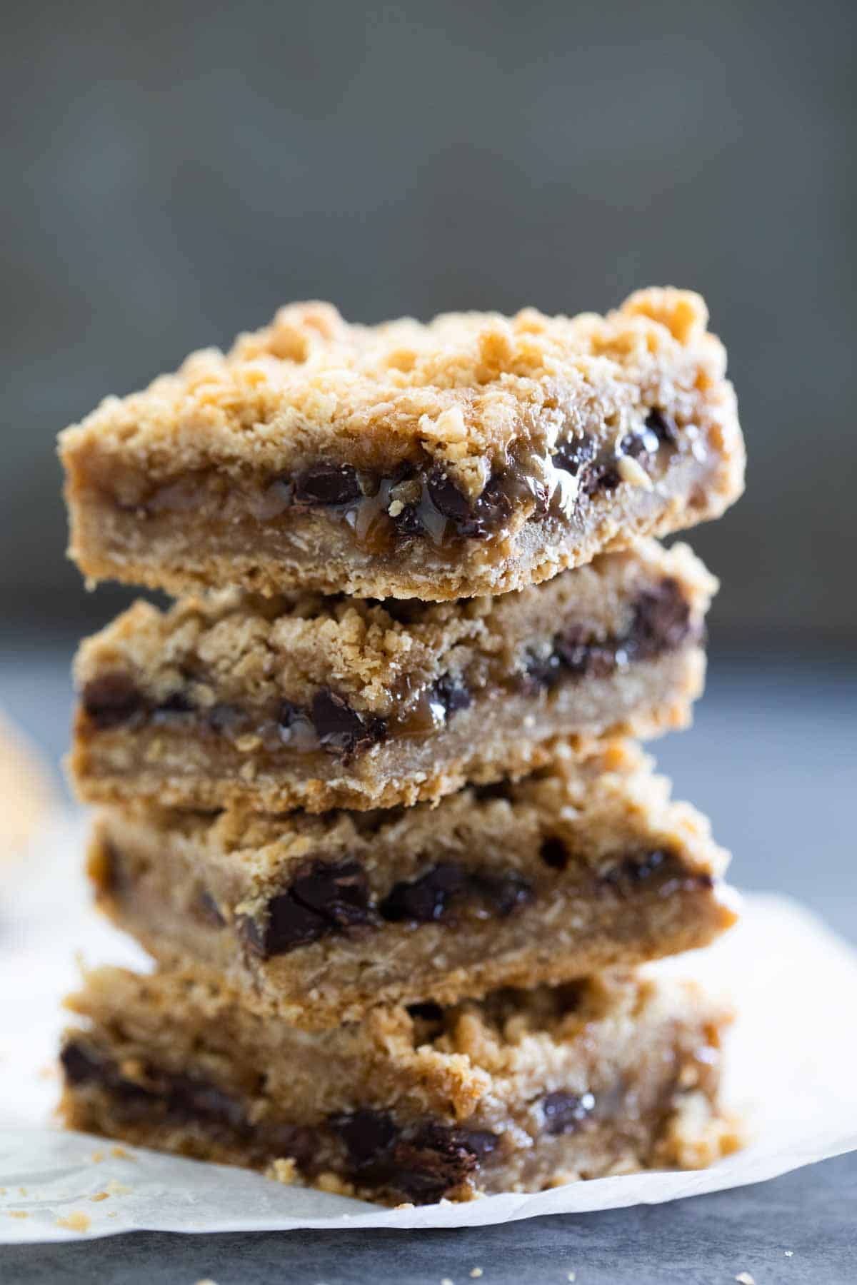 Oatmeal Carmelita Bars stacked on top of each other.