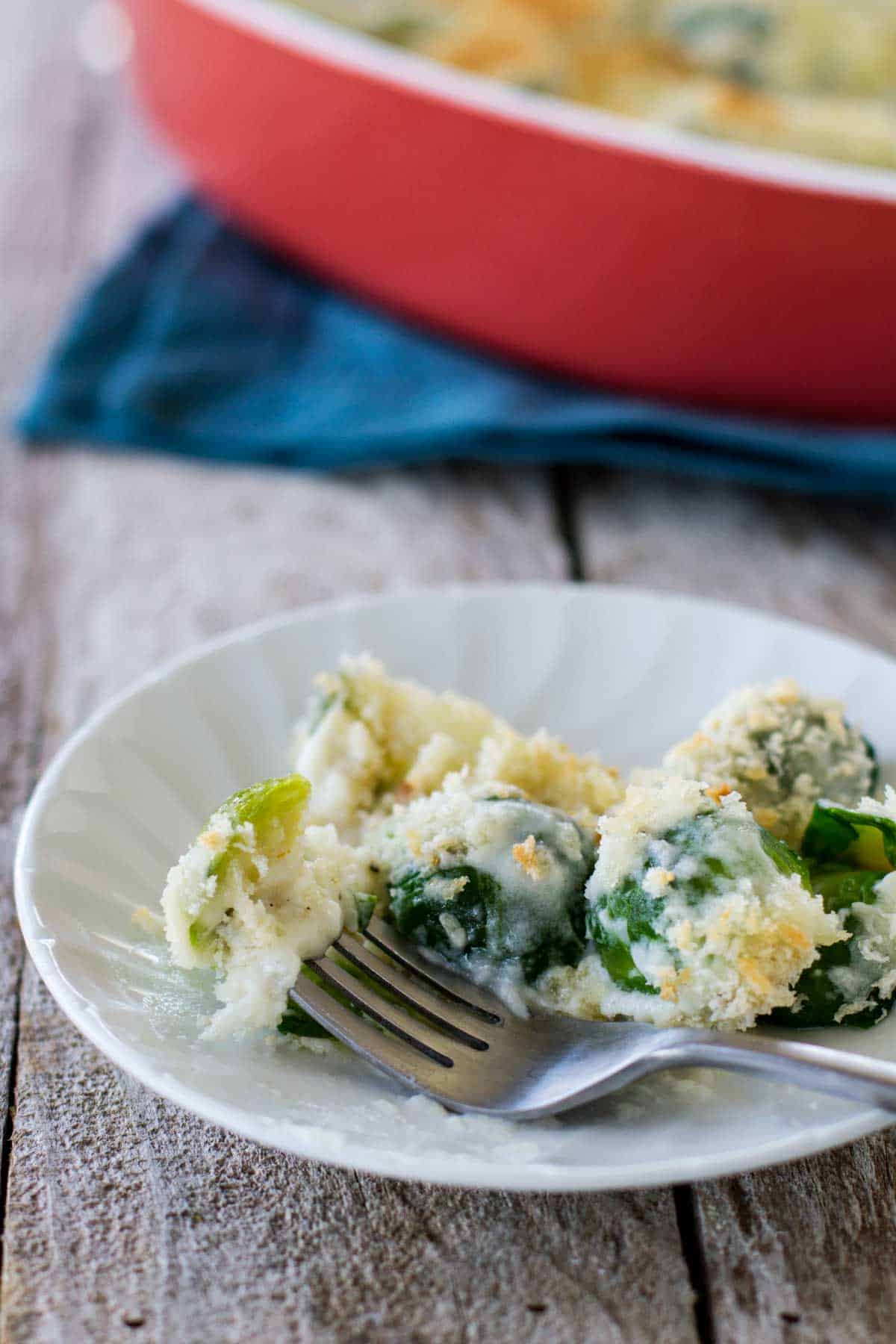 Thanksgiving Side Dish Recipe - Brussels Sprouts Gratin on a plate.