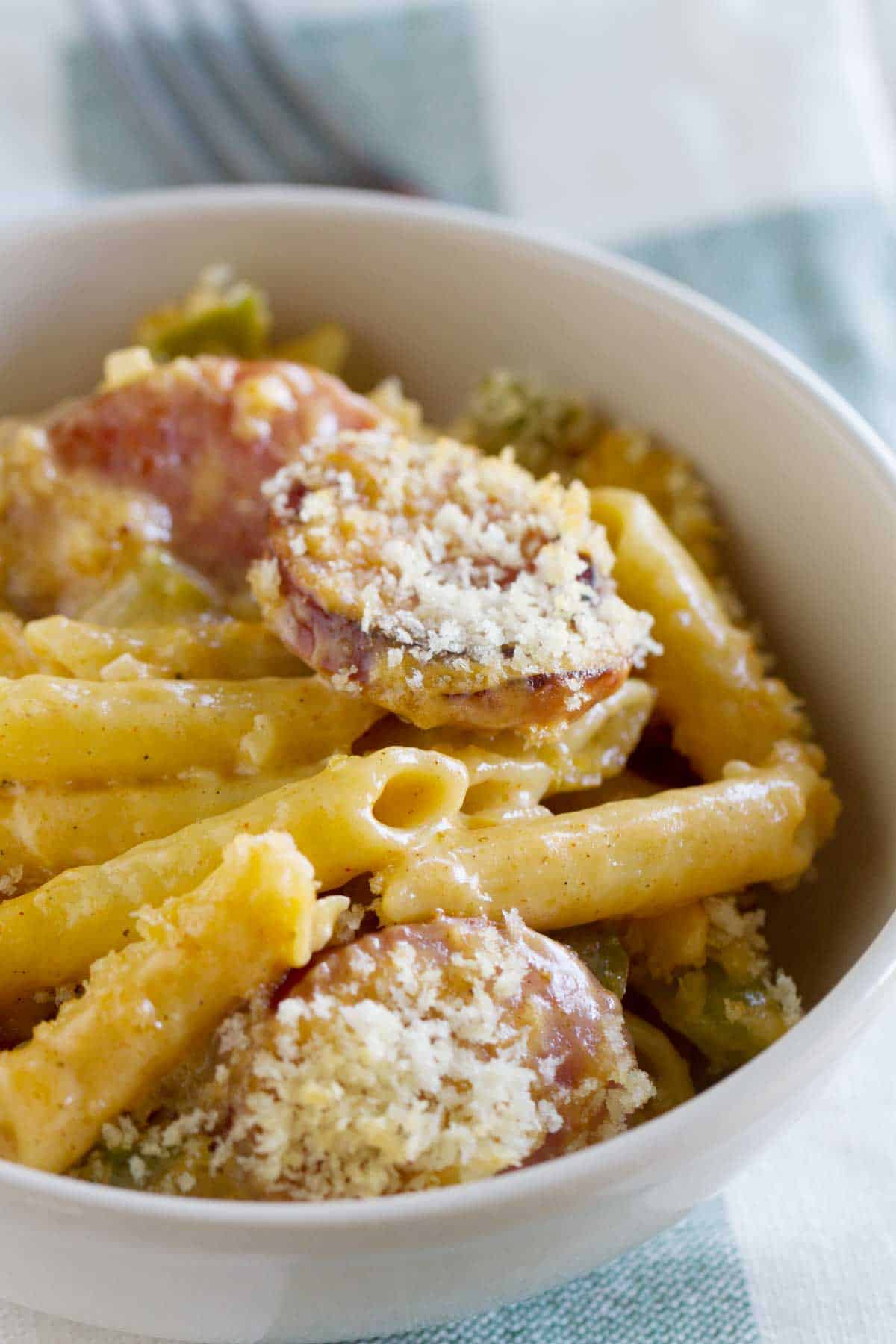 Bowl filled with Cheesy Baked Cajun Pasta.