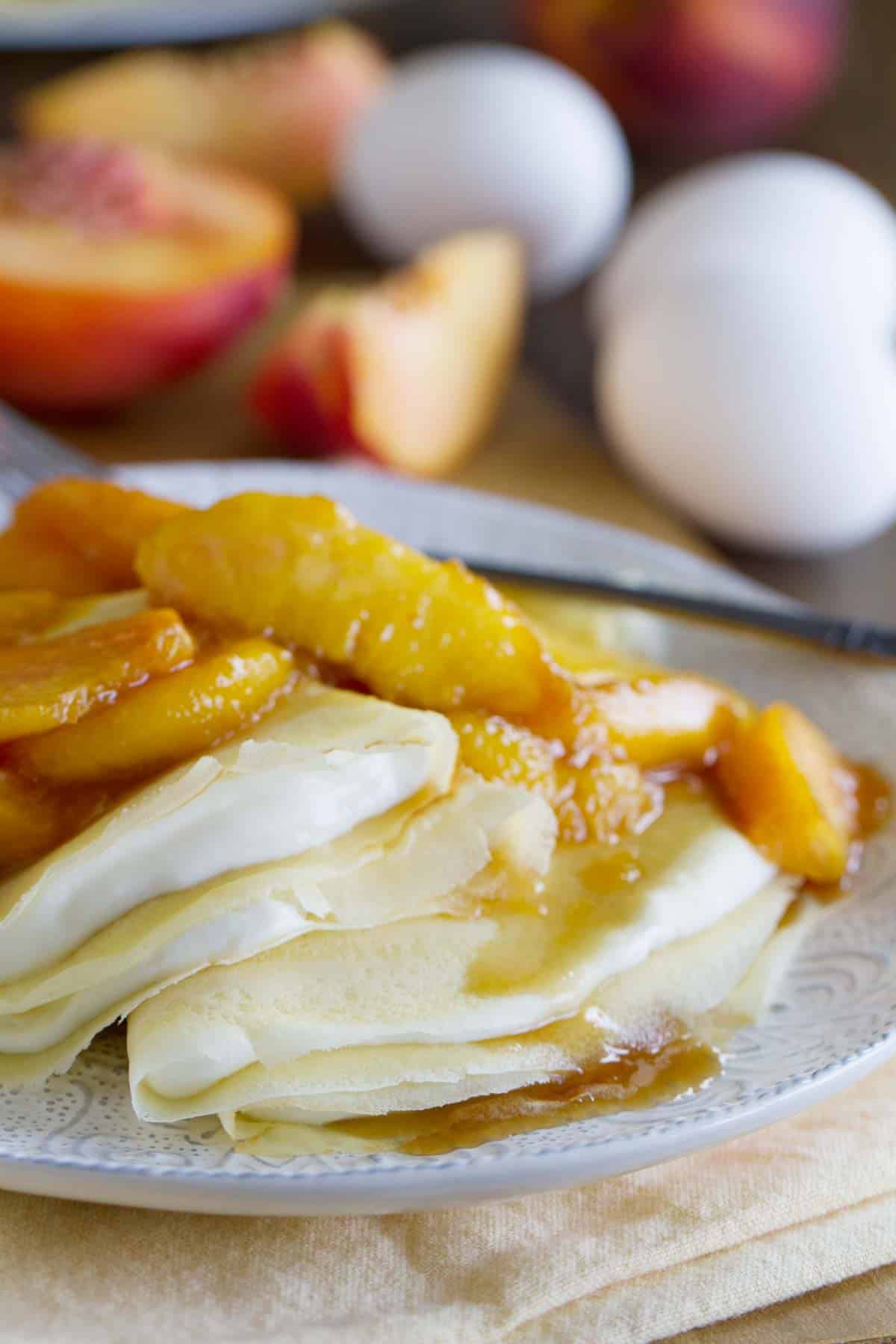 Easy Crepes Recipe with Peaches and Cream - Taste and Tell