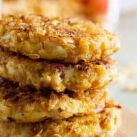 Four crispy onion potato pancakes stacked on top of each other.