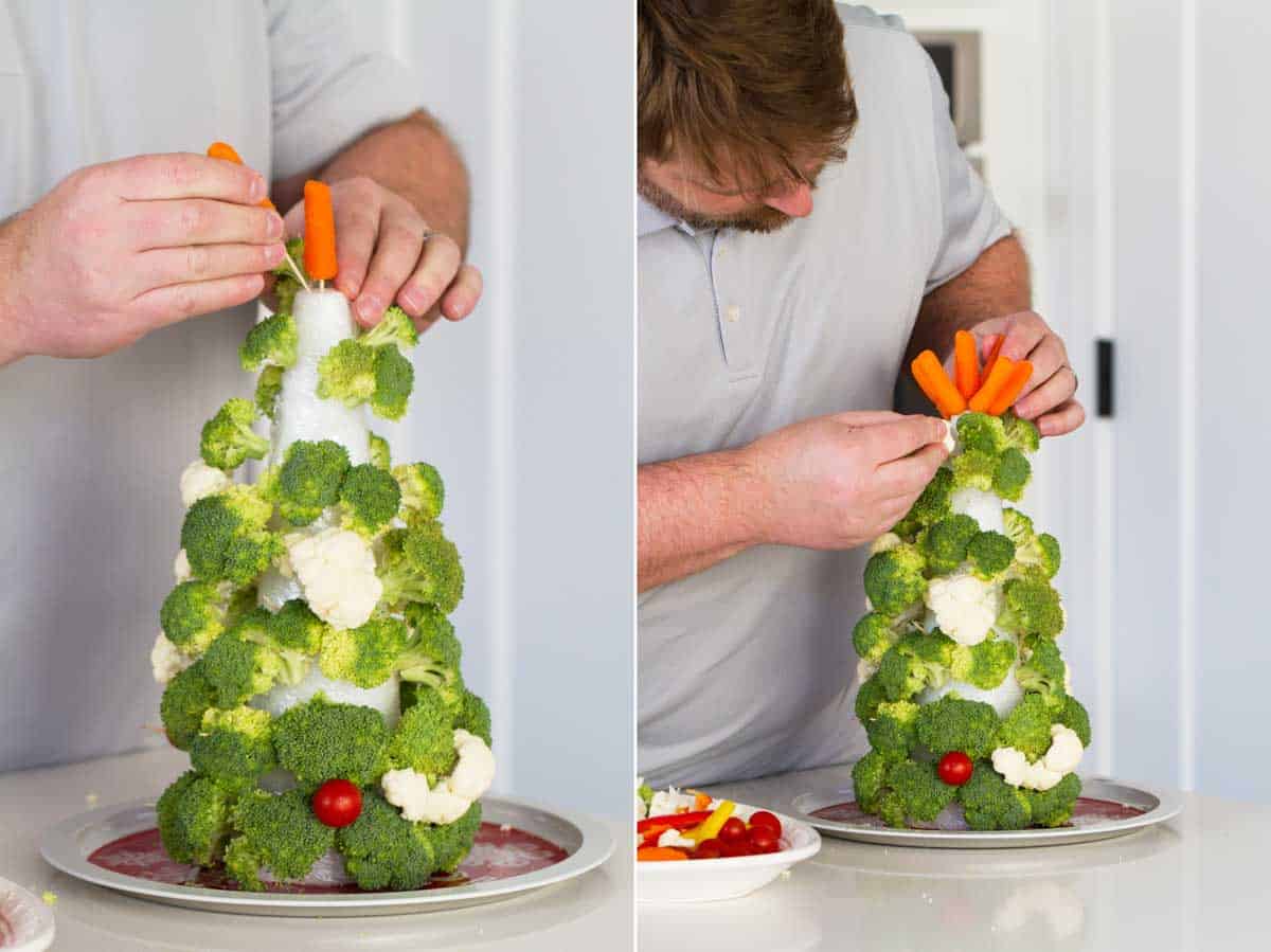 Man assembling a Vegetable Christmas tree.