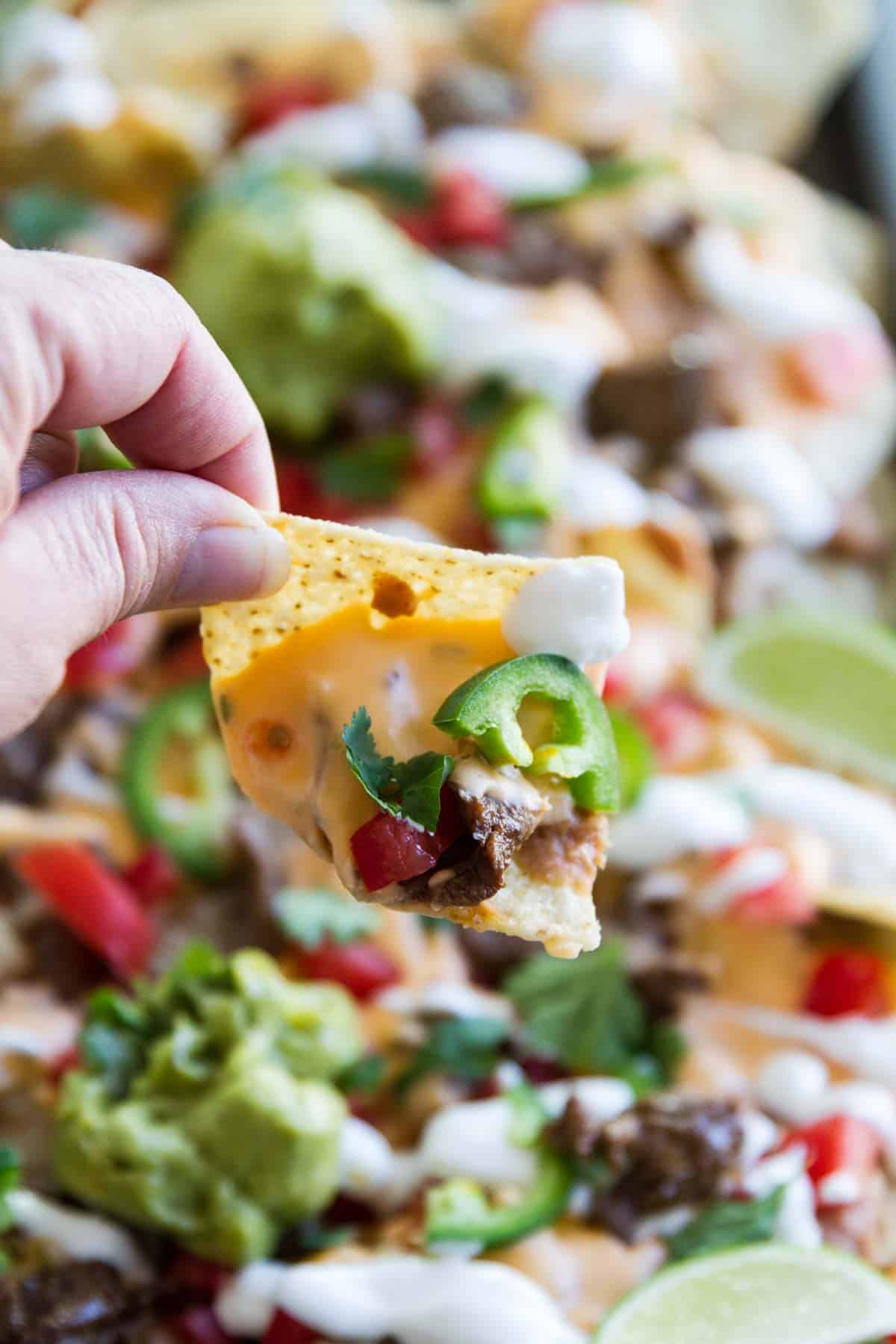 Tailgating recipe - Sheet Pan Steak Nachos Supreme.