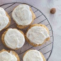 eggnog cookies with frosting and nutmeg