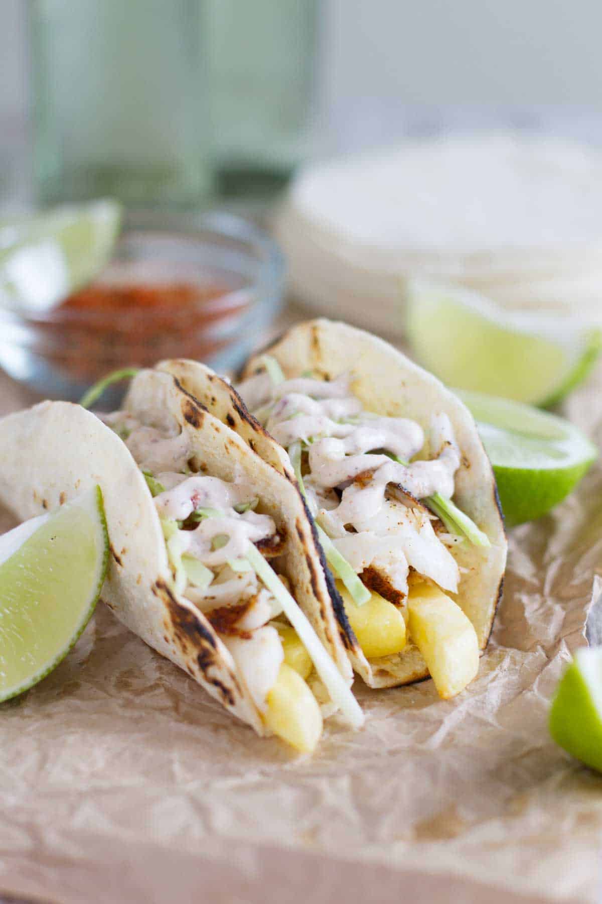 https://www.tasteandtellblog.com/wp-content/uploads/2020/03/Fish-and-Chips-Tacos-recipe-Taste-and-Tell-1-new.jpg