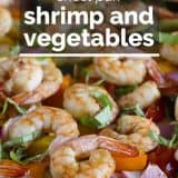 cooked shrimp and vegetables with text overlay