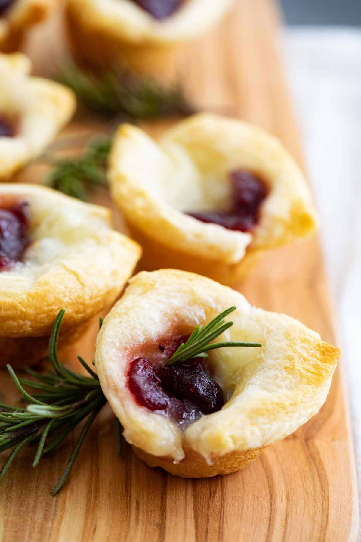 https://www.tasteandtellblog.com/wp-content/uploads/2020/11/Cranberry-Brie-Bites-vertical.jpg