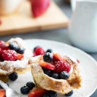 French Toast Cups filled with fresh berries on a plate