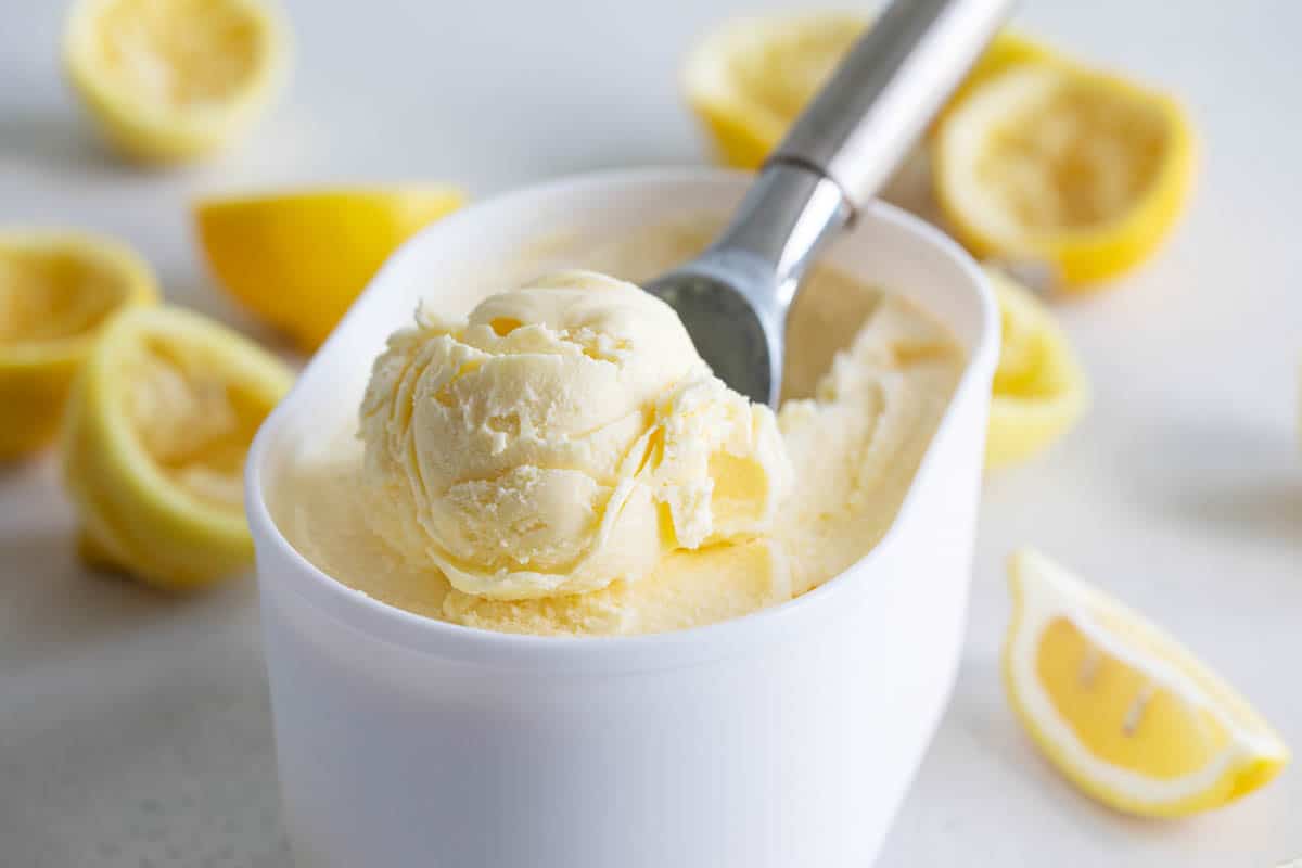 https://www.tasteandtellblog.com/wp-content/uploads/2021/06/Lemon-Ice-Cream-1.jpg
