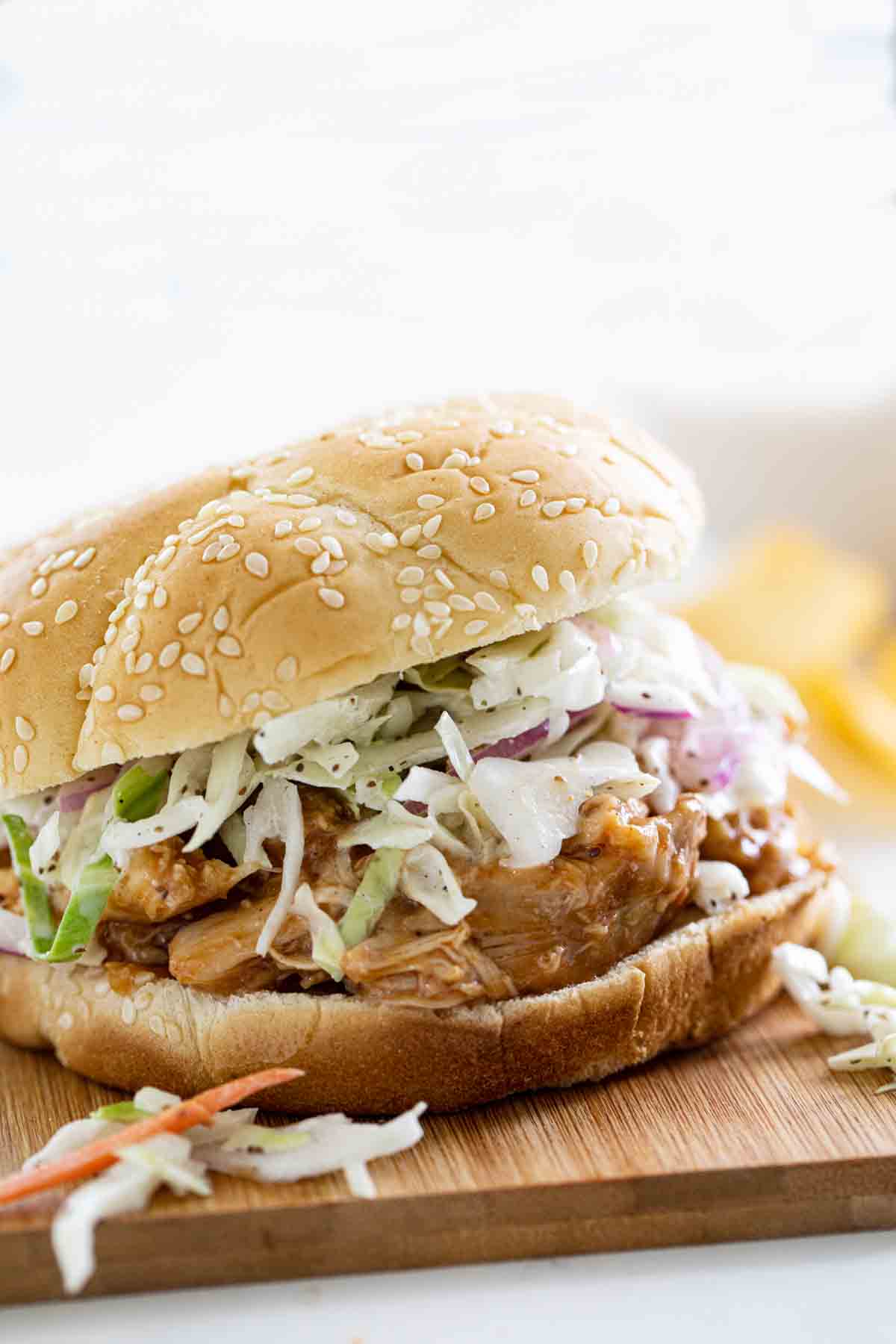 https://www.tasteandtellblog.com/wp-content/uploads/2021/06/Slow-Cooker-Teriyaki-Chicken-Sandwich-vertical.jpg