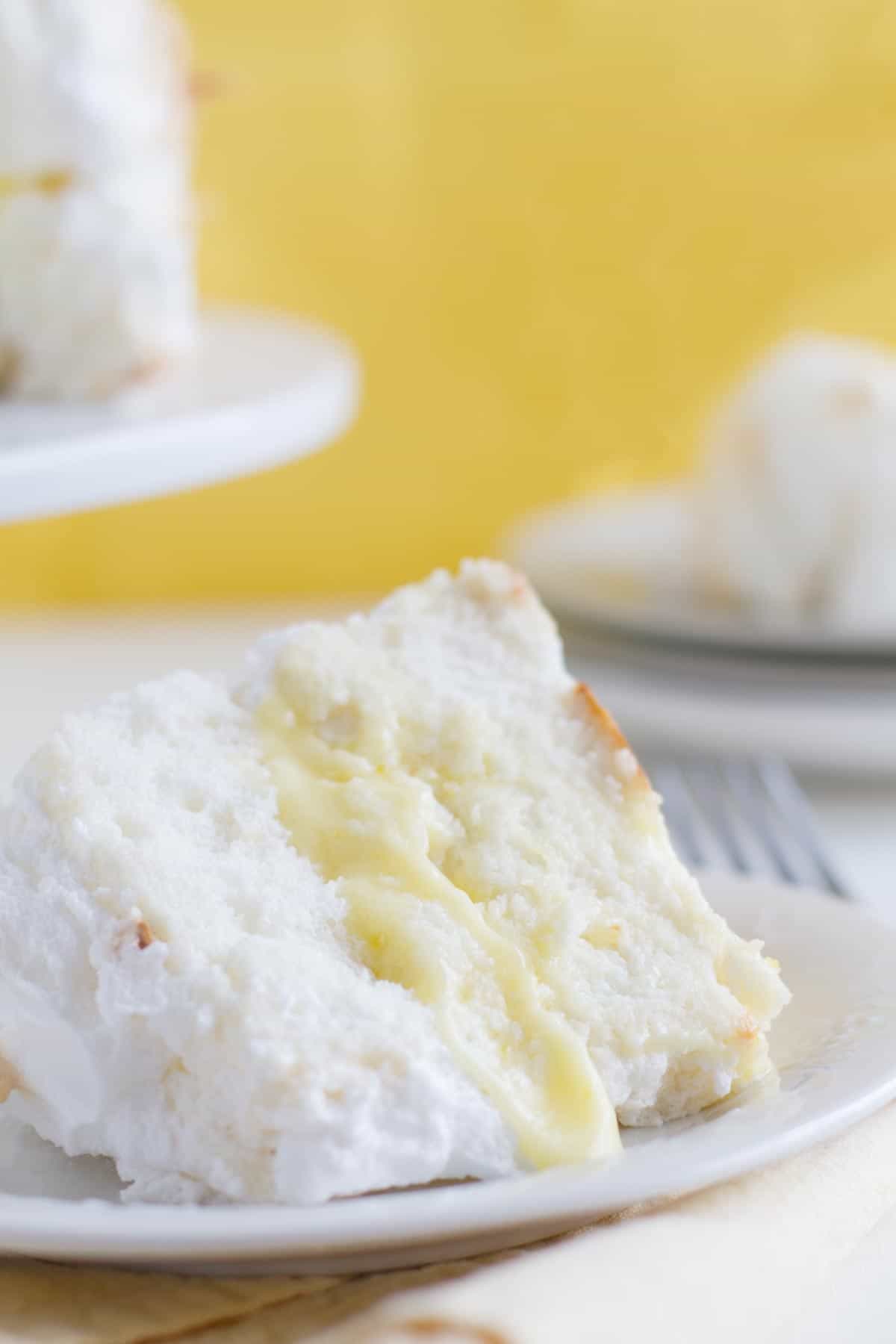 https://www.tasteandtellblog.com/wp-content/uploads/2022/04/Lemon-Meringue-Angel-Cake-3.jpg