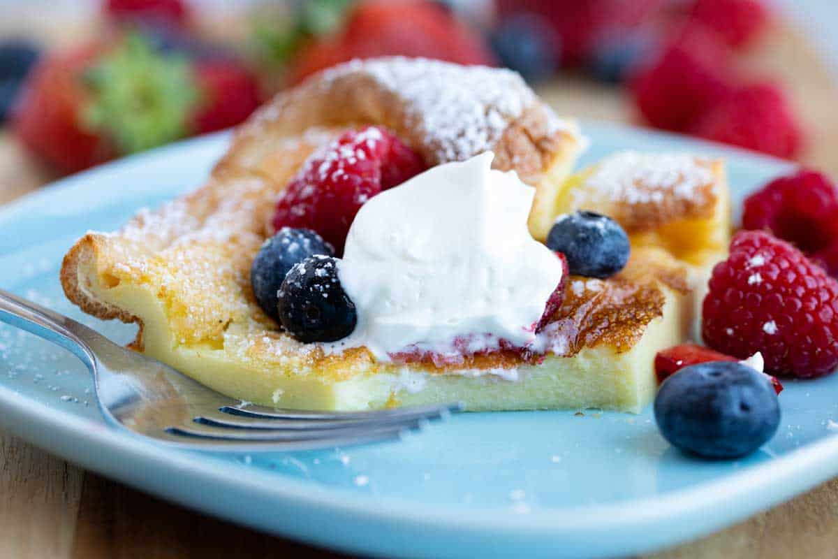 Dutch baby with a bite taken from it.