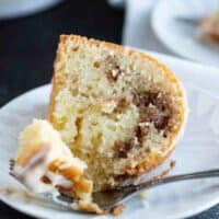 slice of sour cream coffee cake with a fork