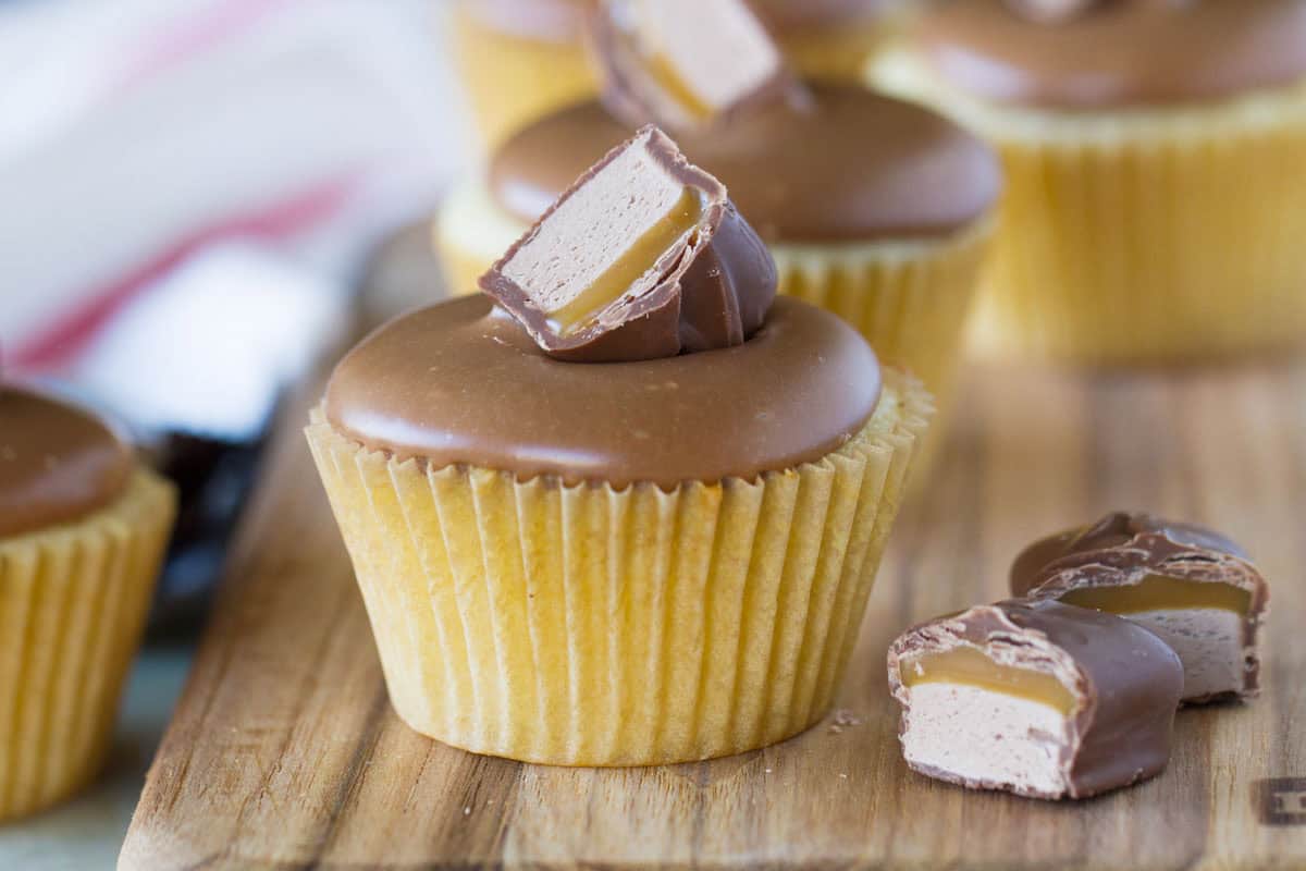 Milky Way Cupcakes - white cupcakes topped with frosting made from Milky Way candy bars.