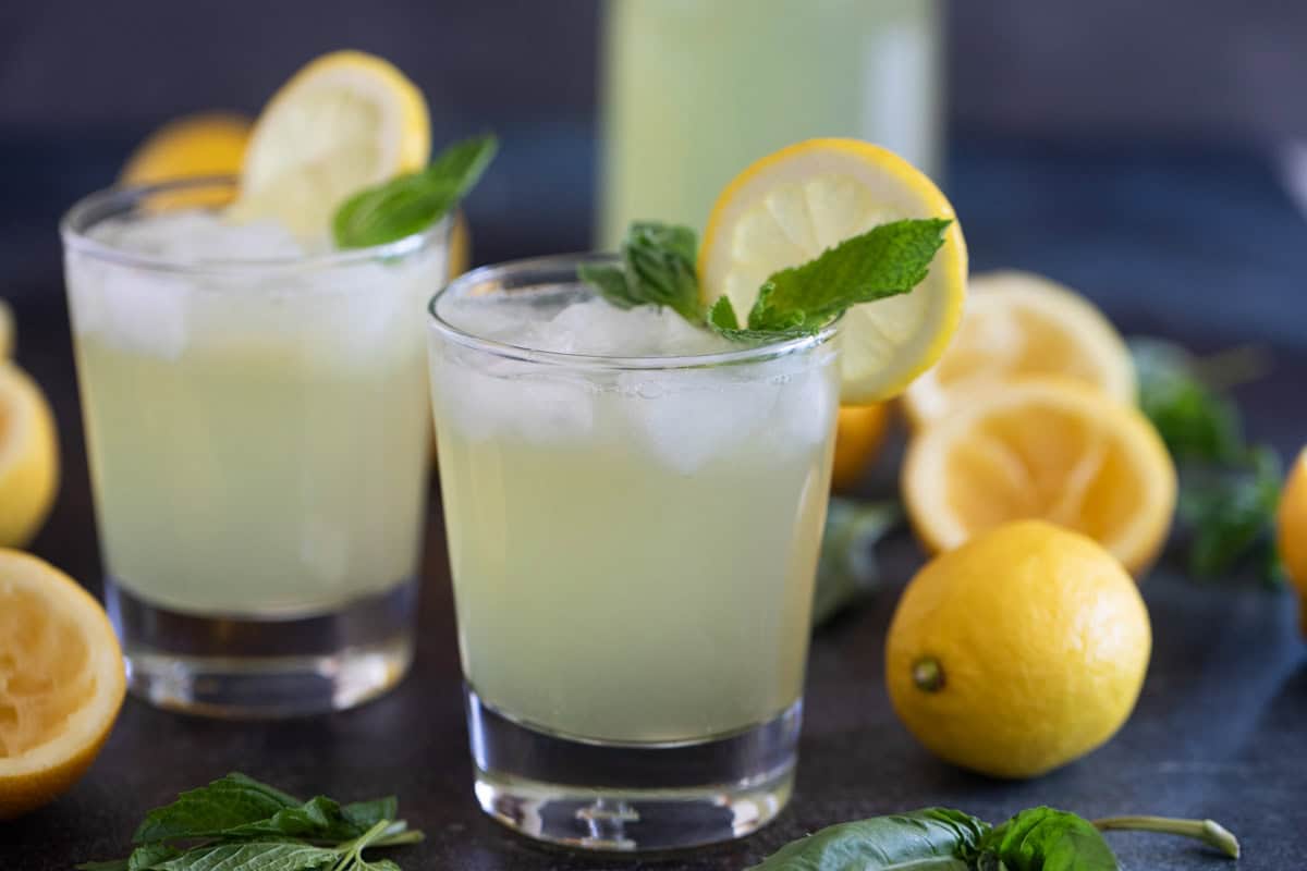 Two glasses of mint and basil lemonade.