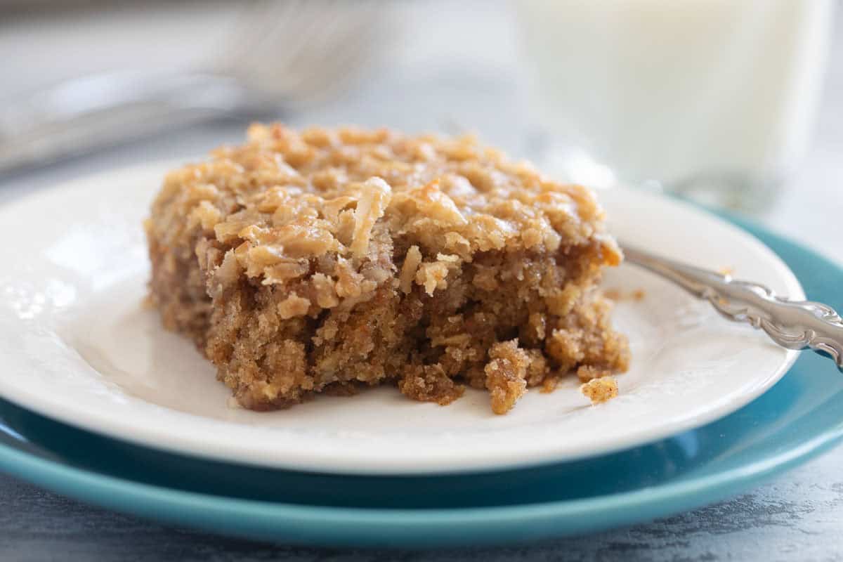 Slice of Oatmeal Cake on a plate with a fork.