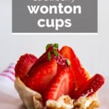 Strawberry wonton cups with text overlay.