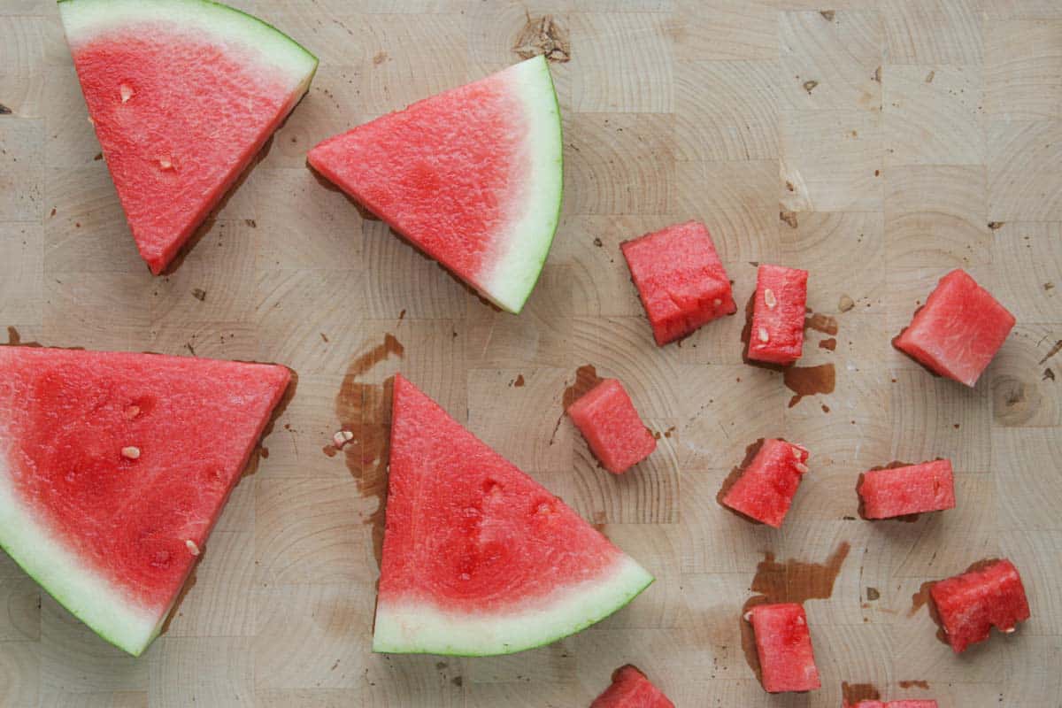 Slices of watermelon and cubed watermelon.