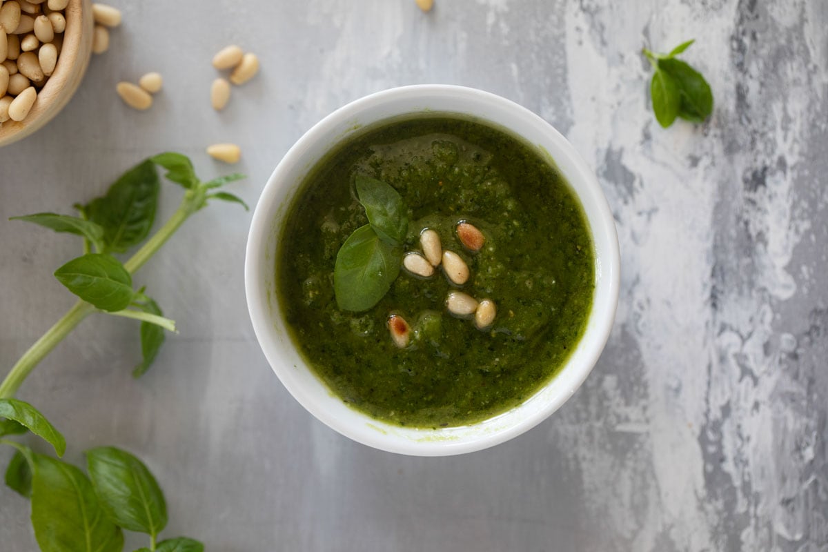 Basil pesto recipe made with fresh basil and pine nuts.