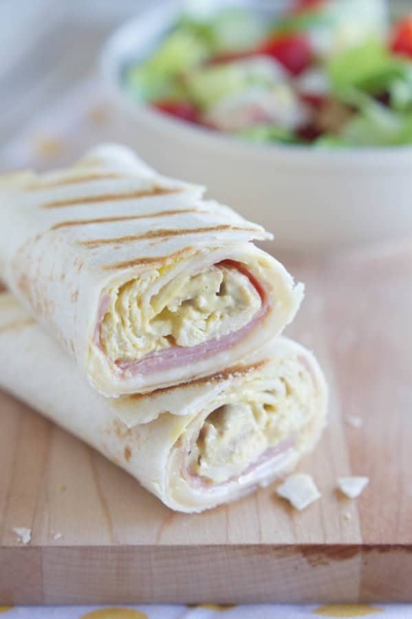 Grilled Chicken Cordon Bleu Wrap cut in half to show interior.