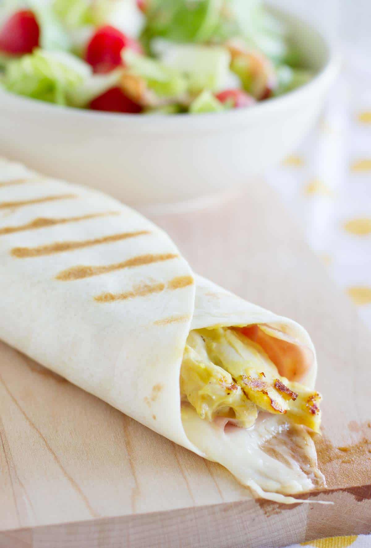 Grilled Chicken Cordon Bleu Wrap with shredded chicken.