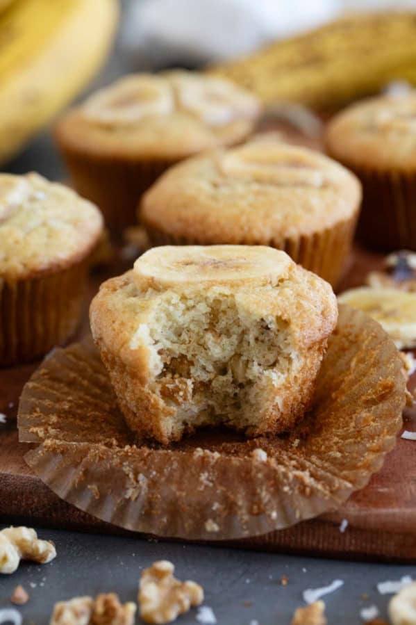 Banana Crunch Muffin with a bite taken from it.