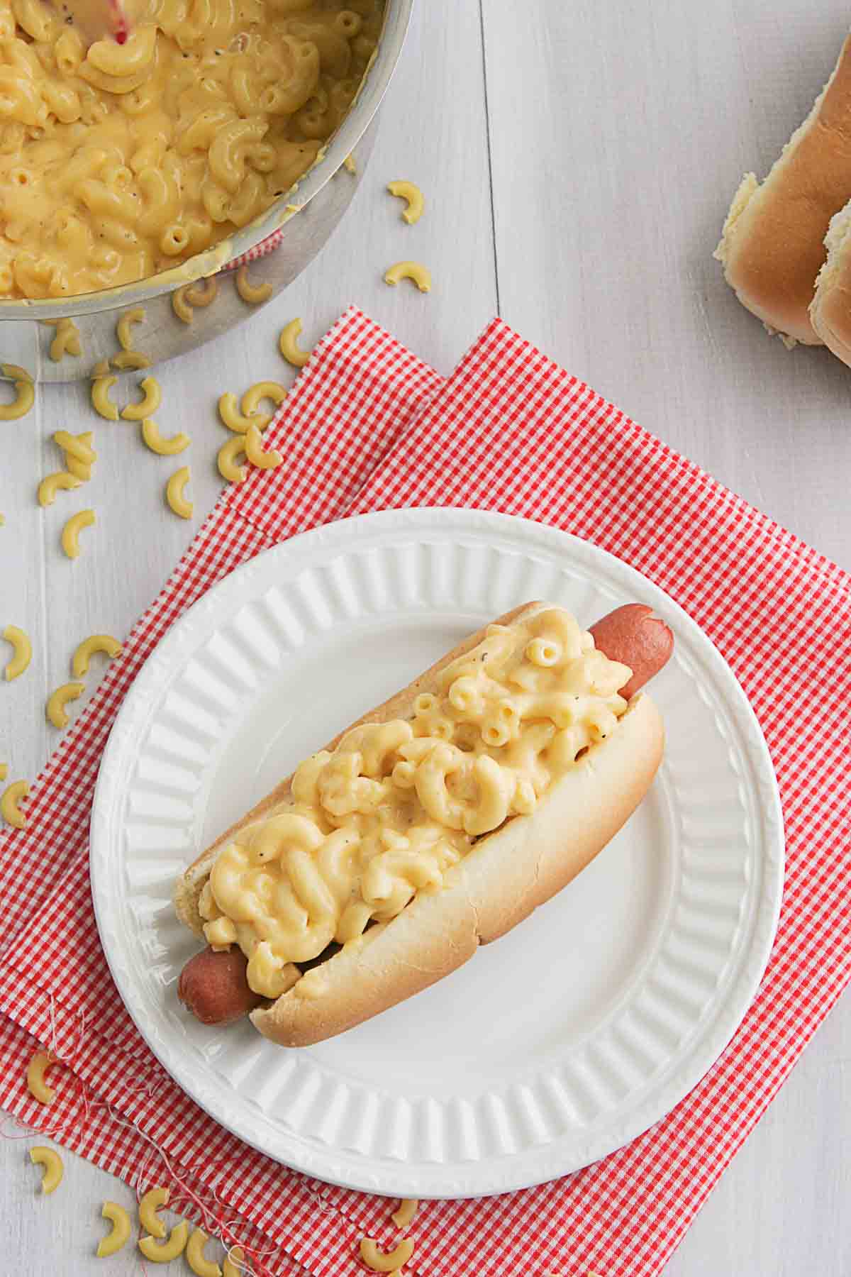 Mac and cheese hot dogs topped with homemade mac and cheese.