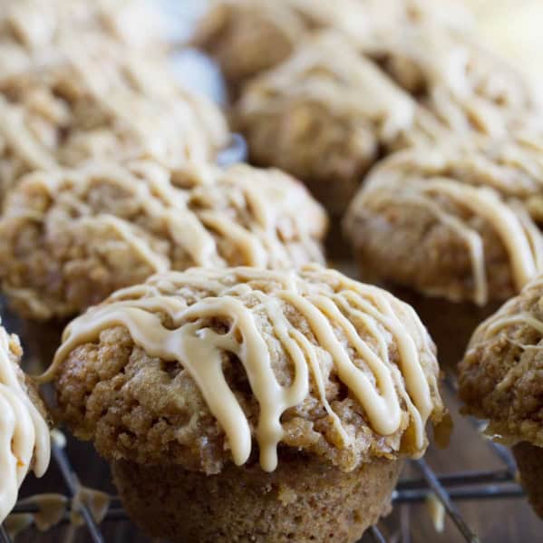 Peanut Butter Banana Bran Muffins with glaze on a cooling rack.