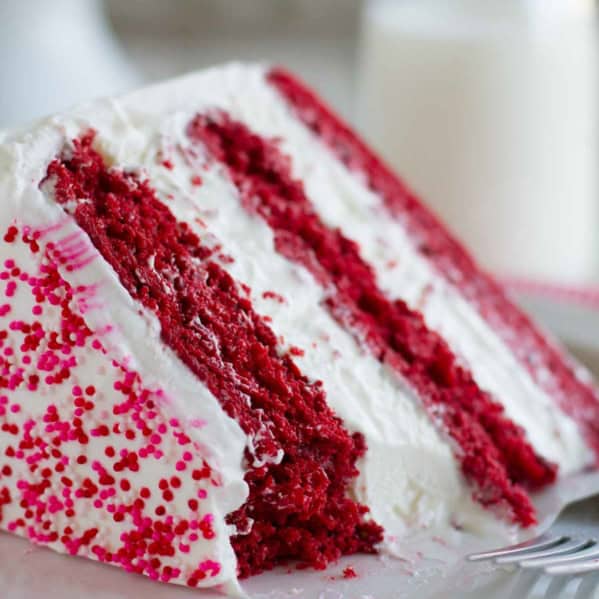 Red Velvet Ice Cream Cake with a bite taken from it.