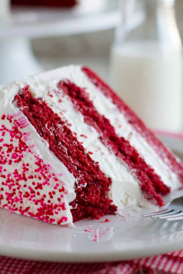 Red Velvet Ice Cream Cake with a bite taken from it.