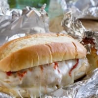 Baked Chicken Parmesan Sandwiches baked in a foil packet.