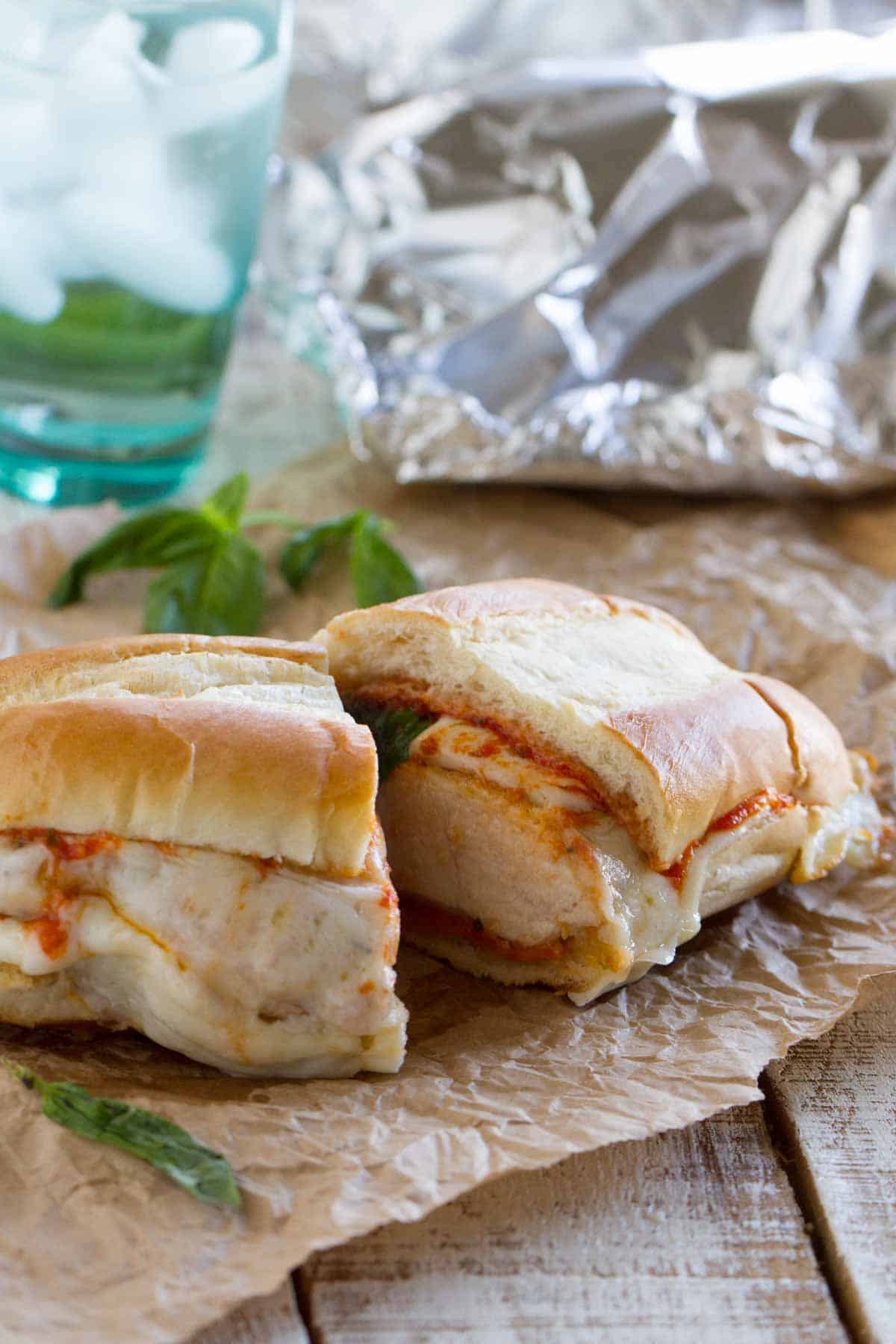 Baked Chicken Parmesan Sandwich cut in half to show interior.