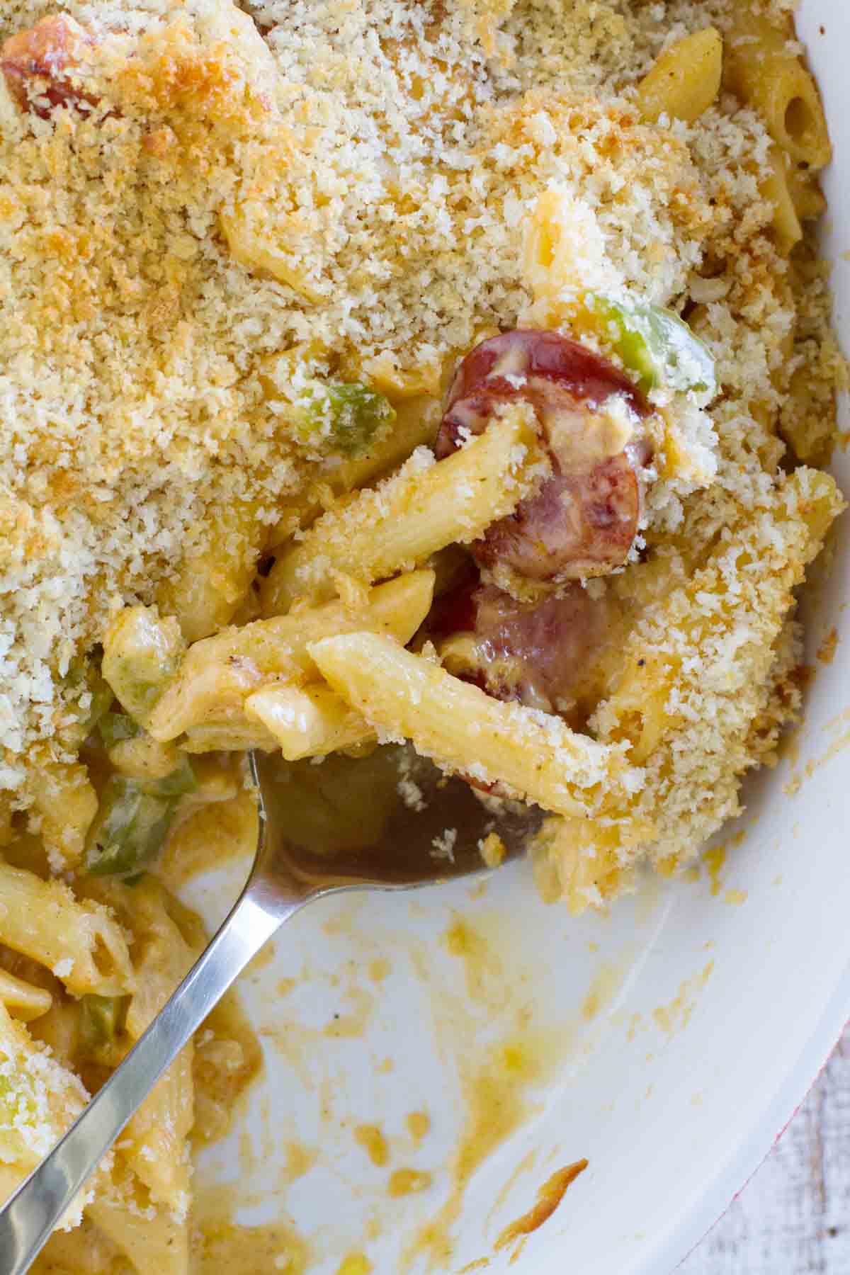 Casserole dish with Cheesy Baked Cajun Pasta.