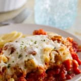 Chicken Parmesan Casserole - an easier version of chicken parmesan, served over spaghetti noodles.