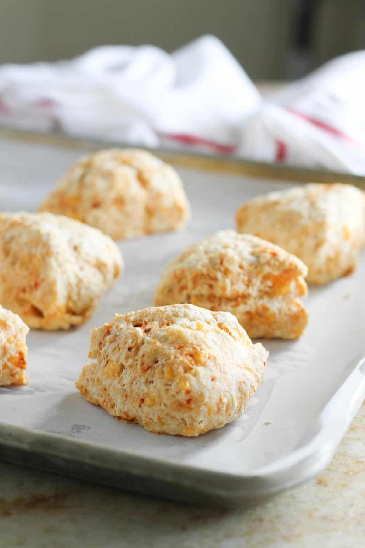 Chipotle Cheddar Scones on a baking sheet.