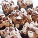 Double Malt Brownies - brownies that are topped with a chocolate malt frosting and then topped with chopped malted milk balls.