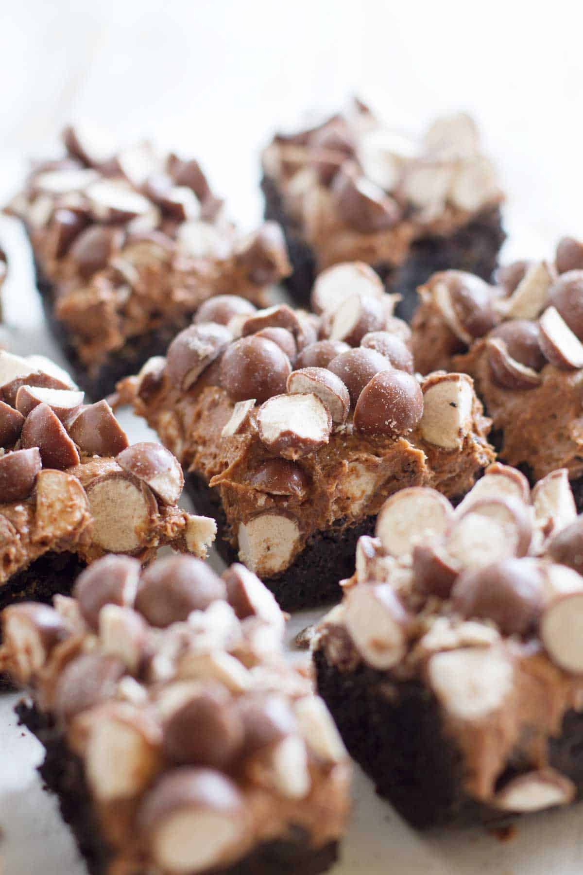 Double Malt Brownies - brownies that are topped with a chocolate malt frosting and then topped with chopped malted milk balls.