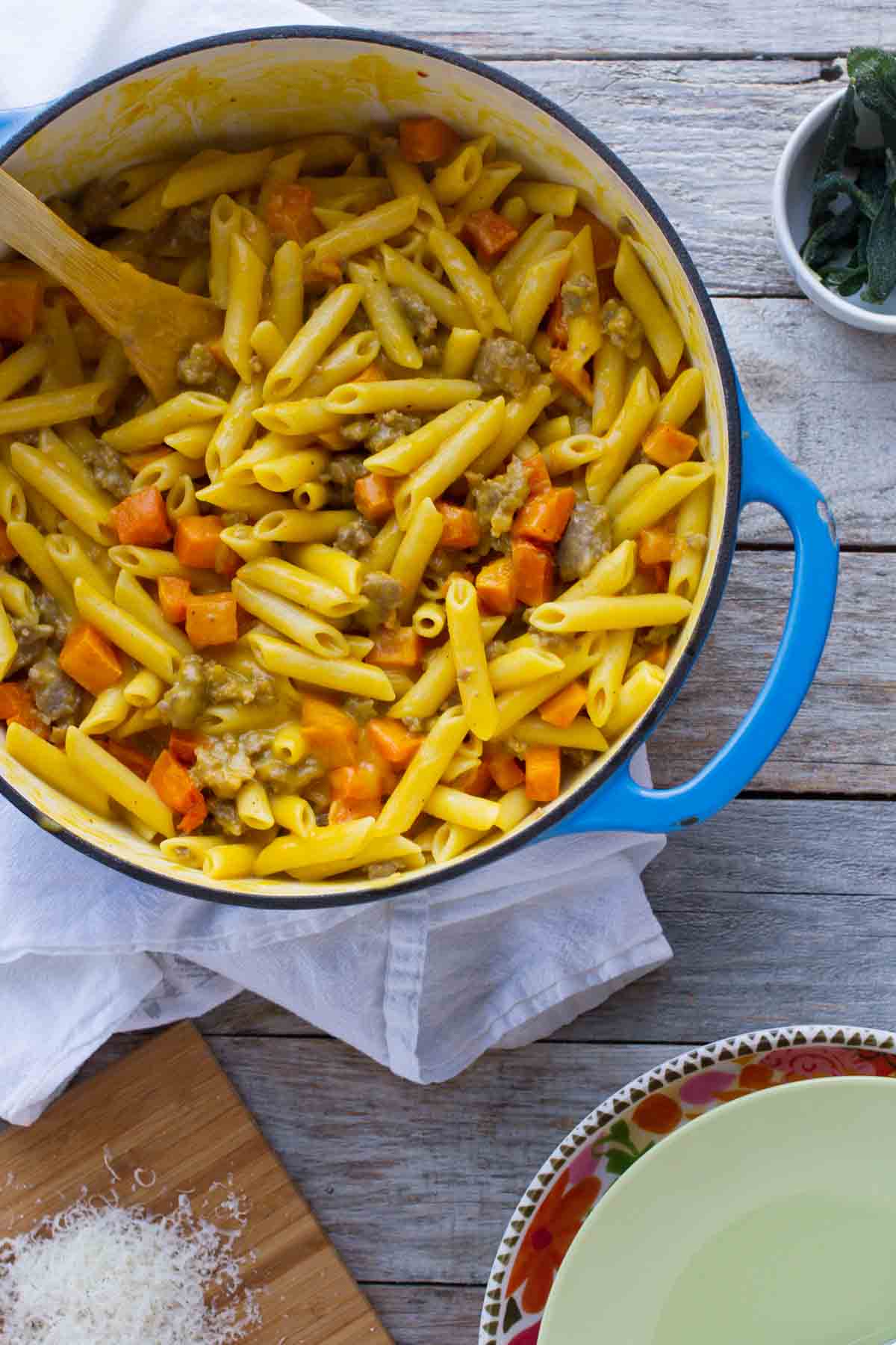 Pot filled with Penne with Butternut Squash and Sausage.