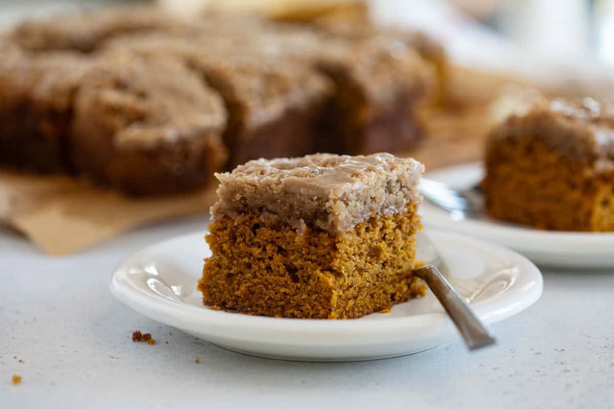 Slice of pumpkin coffee cake on a plate.