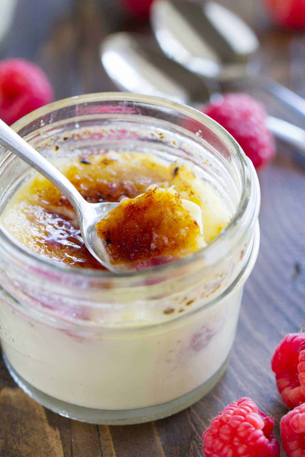 Breaking through the sugar on Raspberry Creme Brûlée.