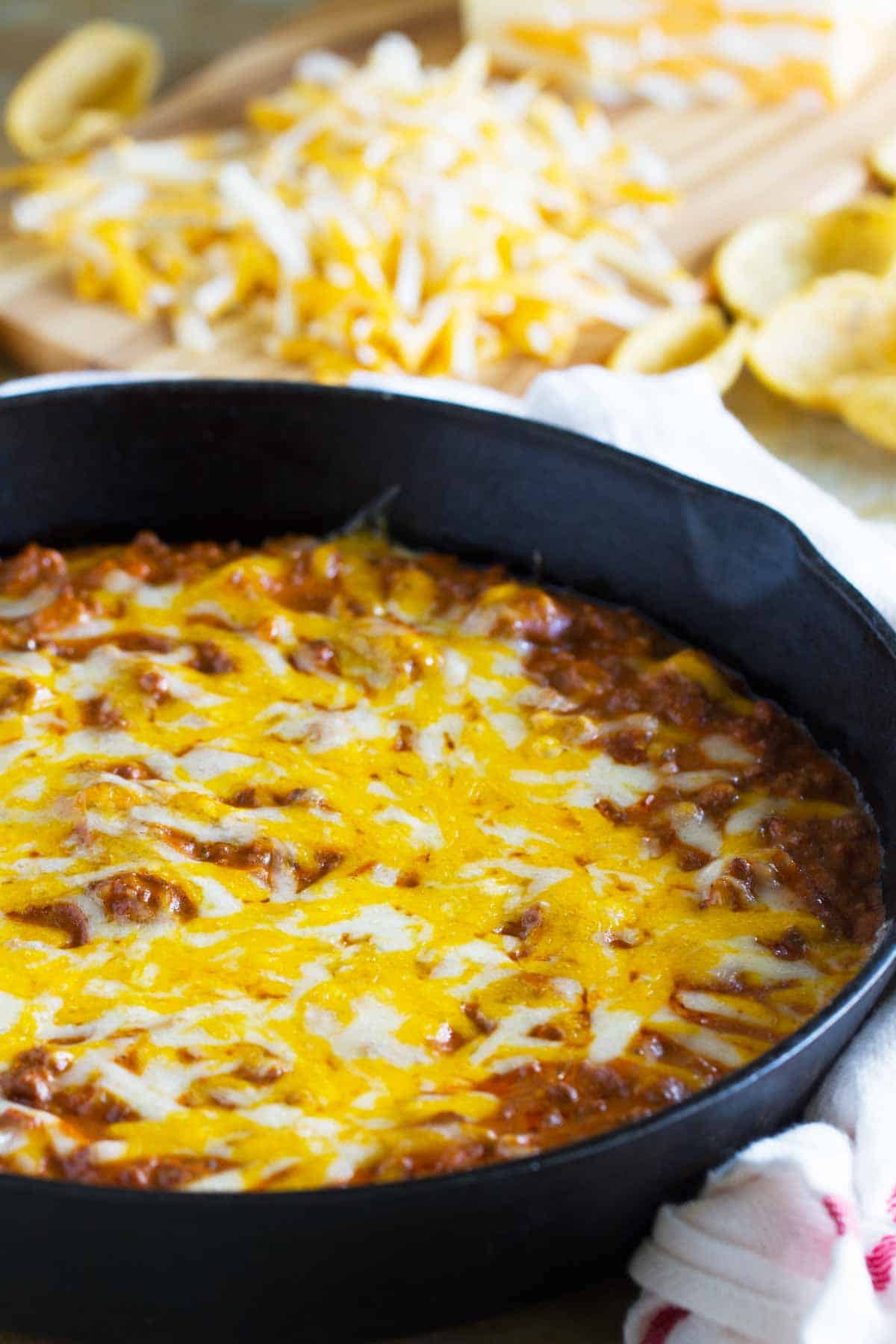 Cast iron skillet filled with Sloppy Joe Dip.