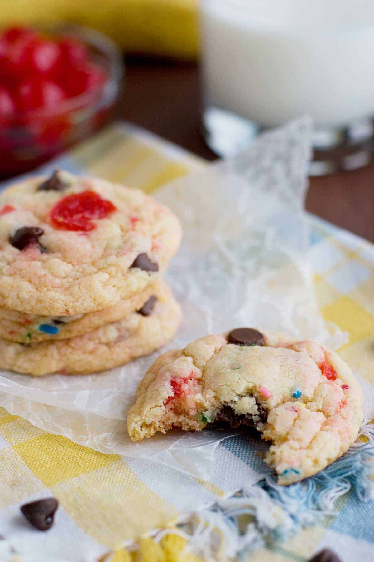 Banana Split Cake Mix Cookies with a bite taken from one.