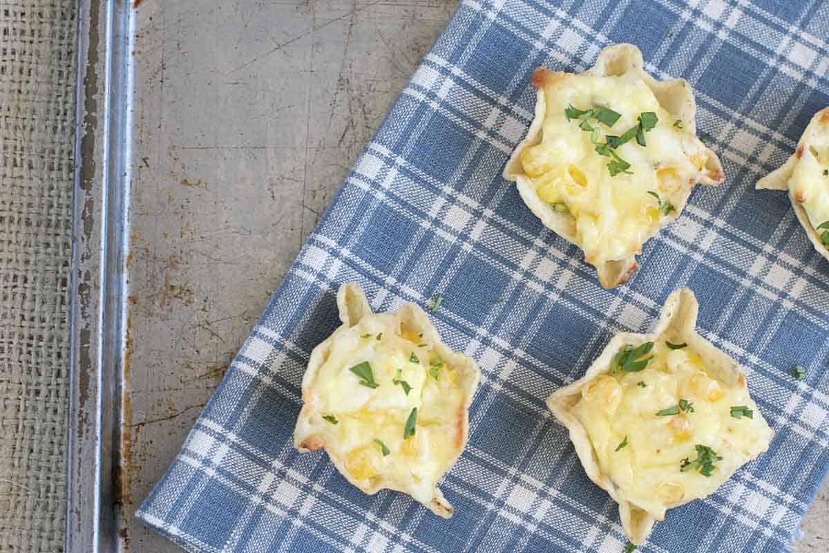 Cheesy corn bites on a towel.