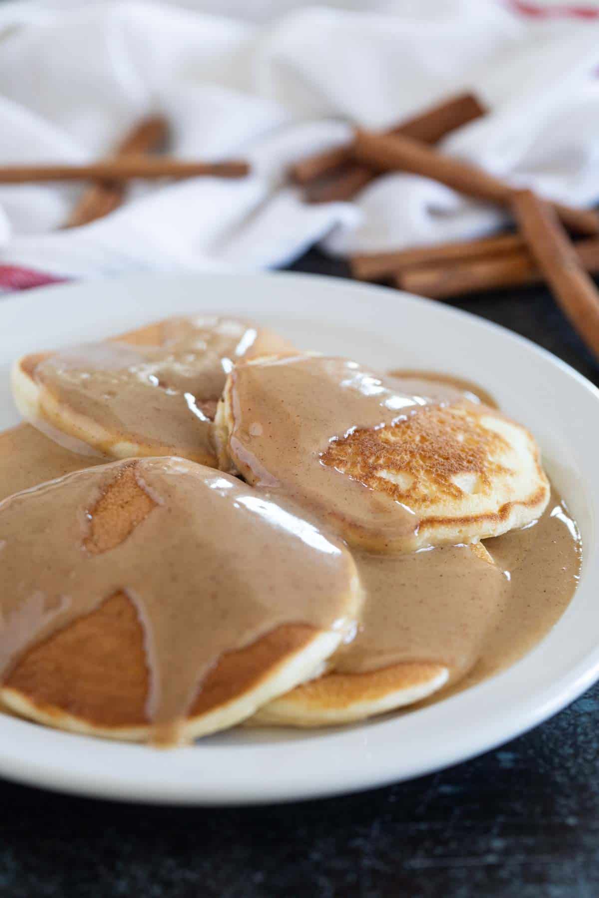 Pancakes topped with Cinnamon Syrup.