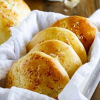 Garlic Parmesan Brioche Buns stacked together.