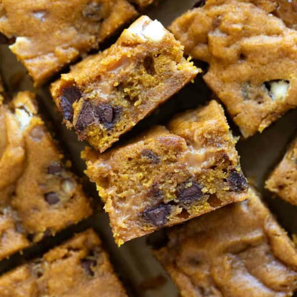 Loaded Caramel Pumpkin Blondies turned on their side to show texture.