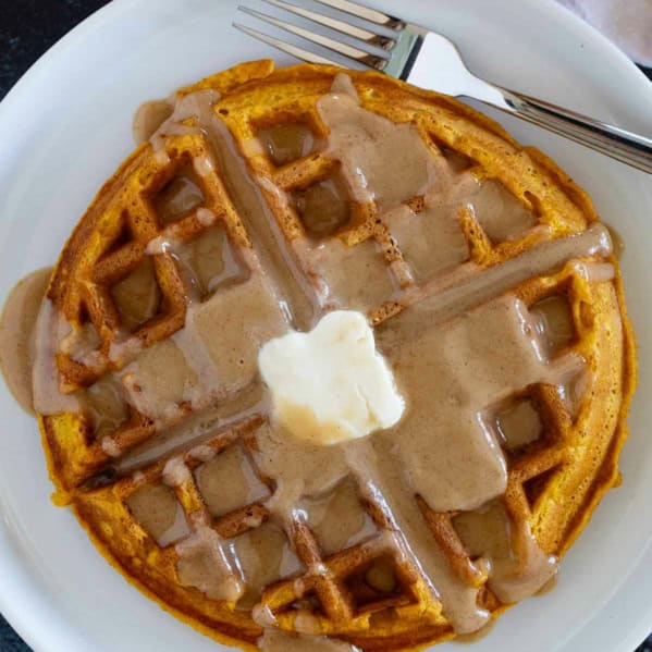 Pumpkin Waffle with cinnamon syrup and butter.