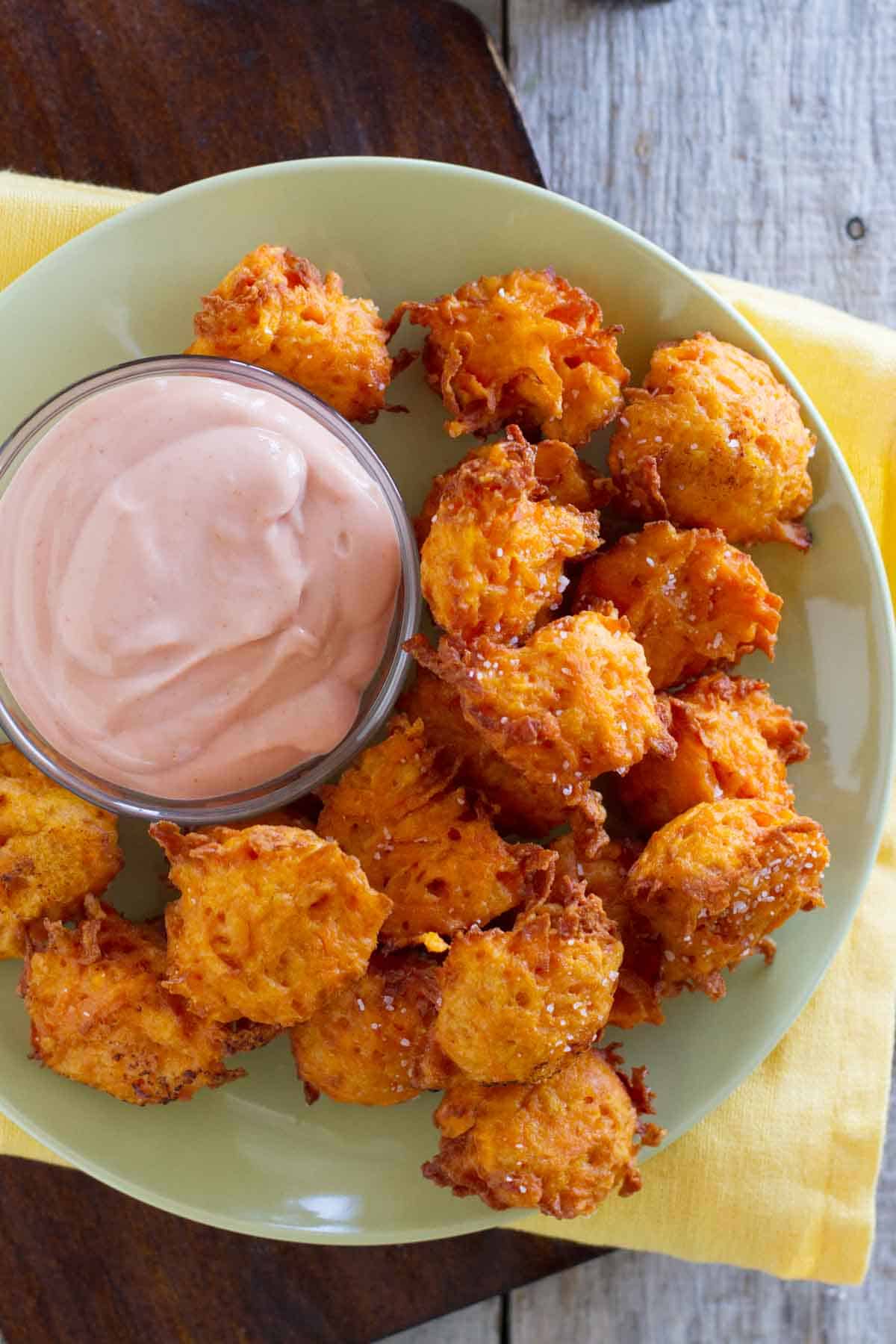 Plate filled with Sweet Potato Tots and a bowl with creamy ketchup.