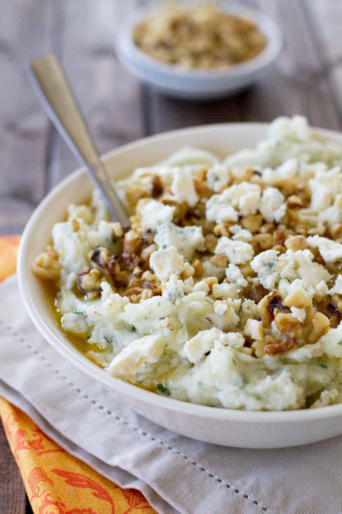 Shallow bowl with Blue Cheese and Walnut Mashed Potatoes.